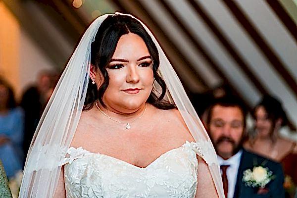 Bride in wedding dress during ceremony
