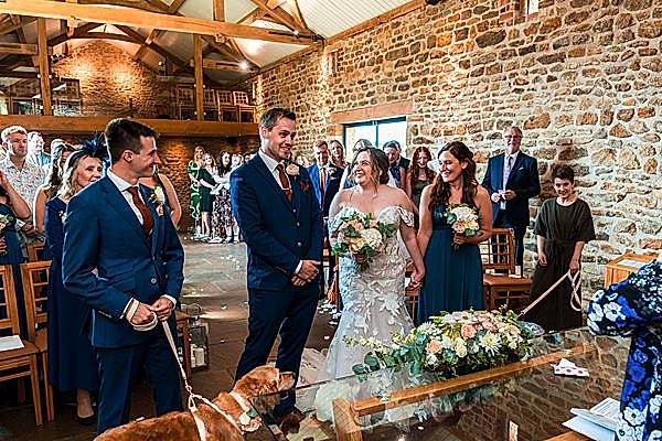 Wedding ceremony in rustic stone barn