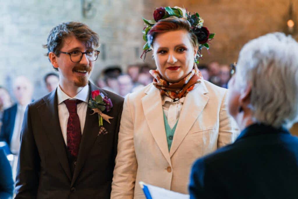 Wedding ceremony with couple and officiant.