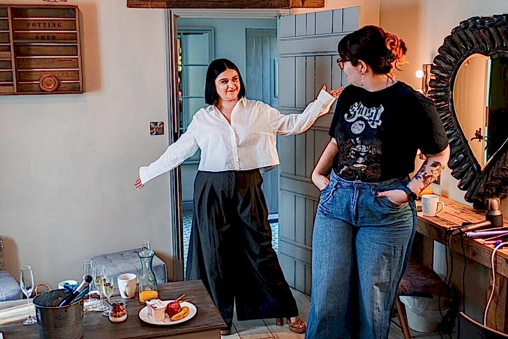 Two women chatting in a cosy room