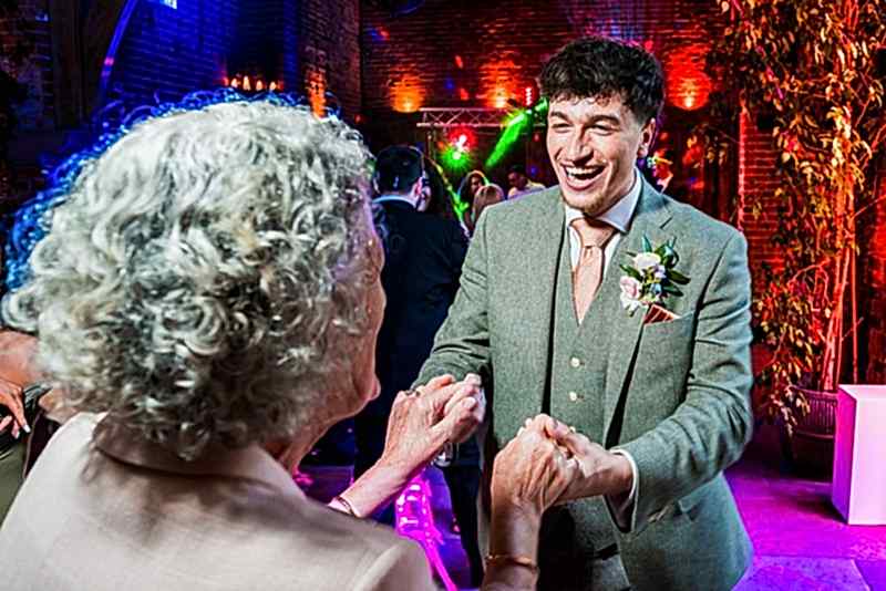 Joyful dancing at a colourful party celebration.